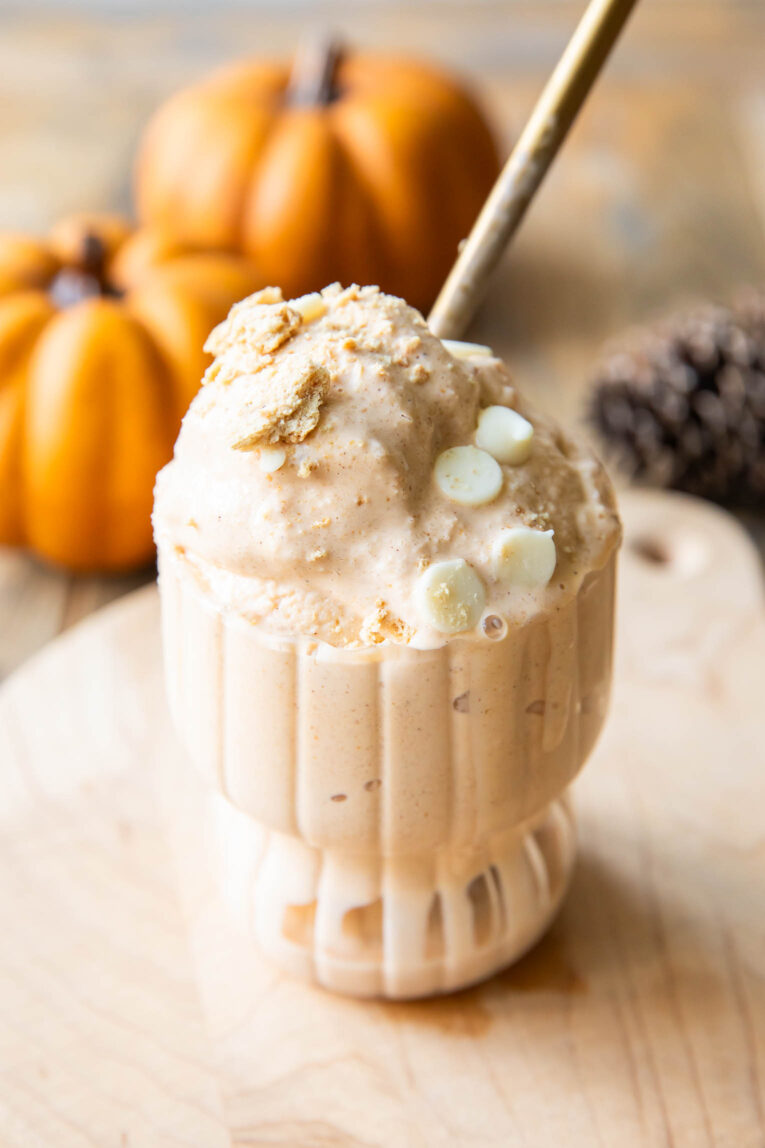 Angled photo of Pumpkin Ice Cream with white chocolate chips and graham crackers.
