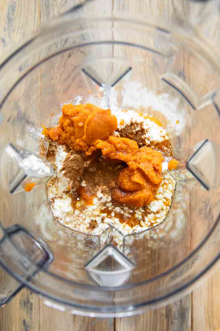 Ingredients for Pumpkin Ice Cream in a blender.