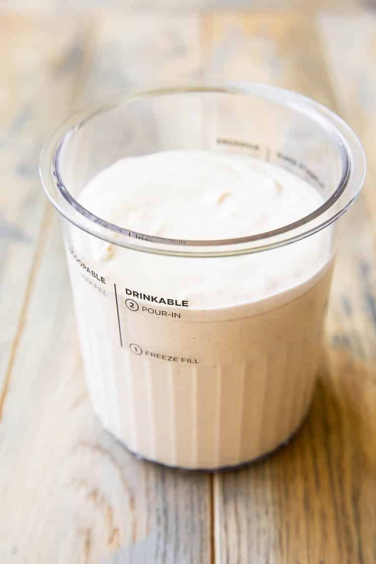 Pumpkin protein Ice Cream in a Ninja Creami pint container.