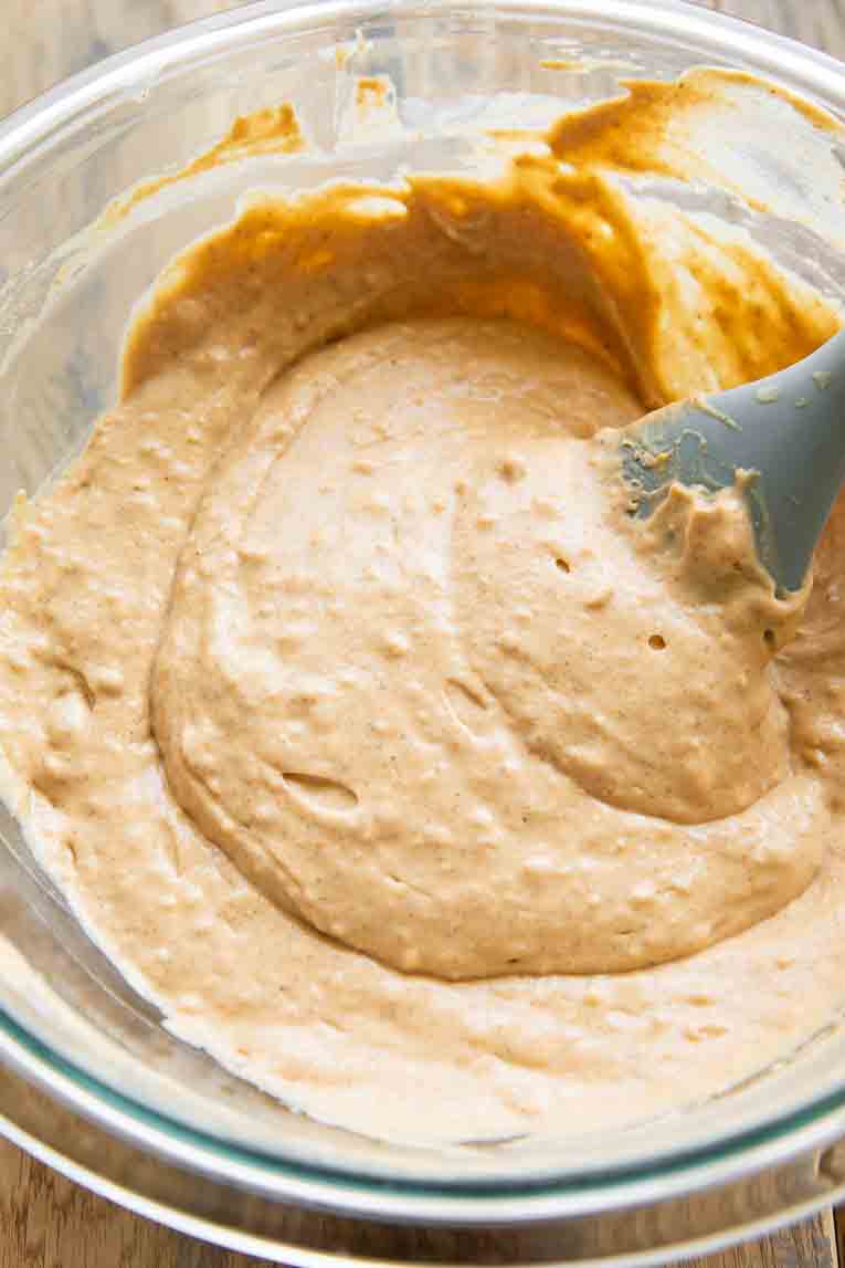 Pumpkin Protein Pancakes batter being mixed in a bowl.