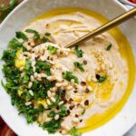 Whipped Feta Dip with pita bread and a spoon.