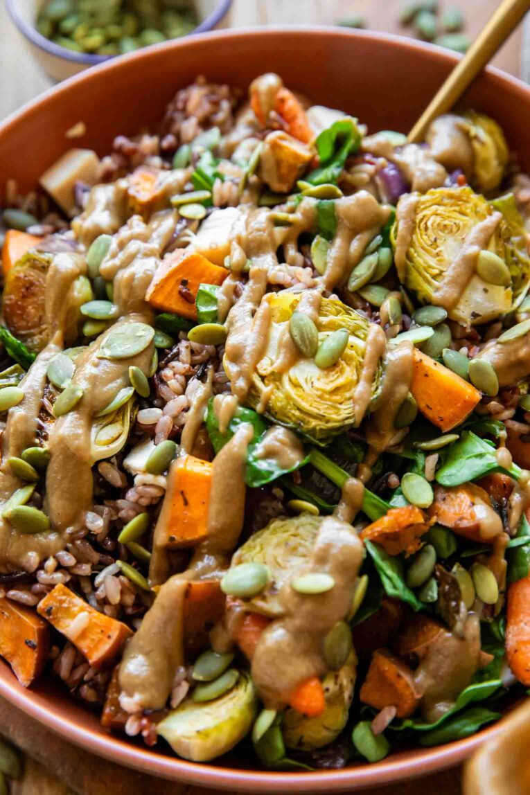 Angled photo of fall harvest bowls with veggies.