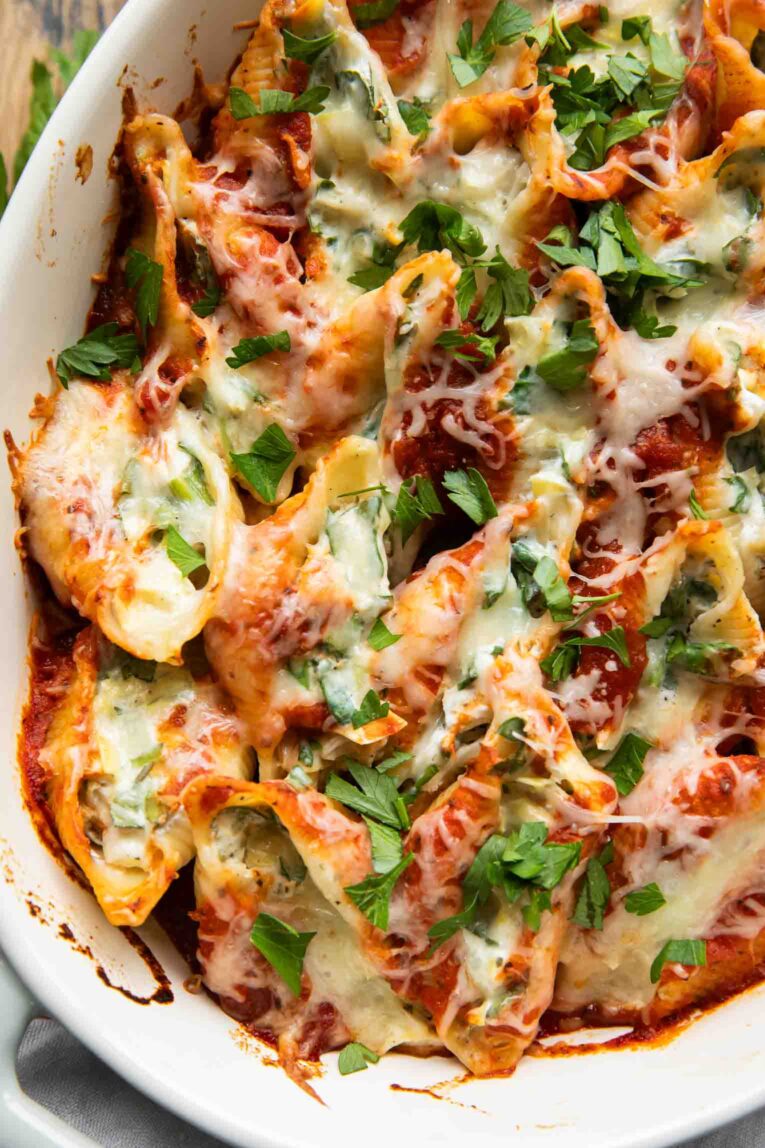 Close up of Chicken Spinach Artichoke Stuffed Shells recipe.