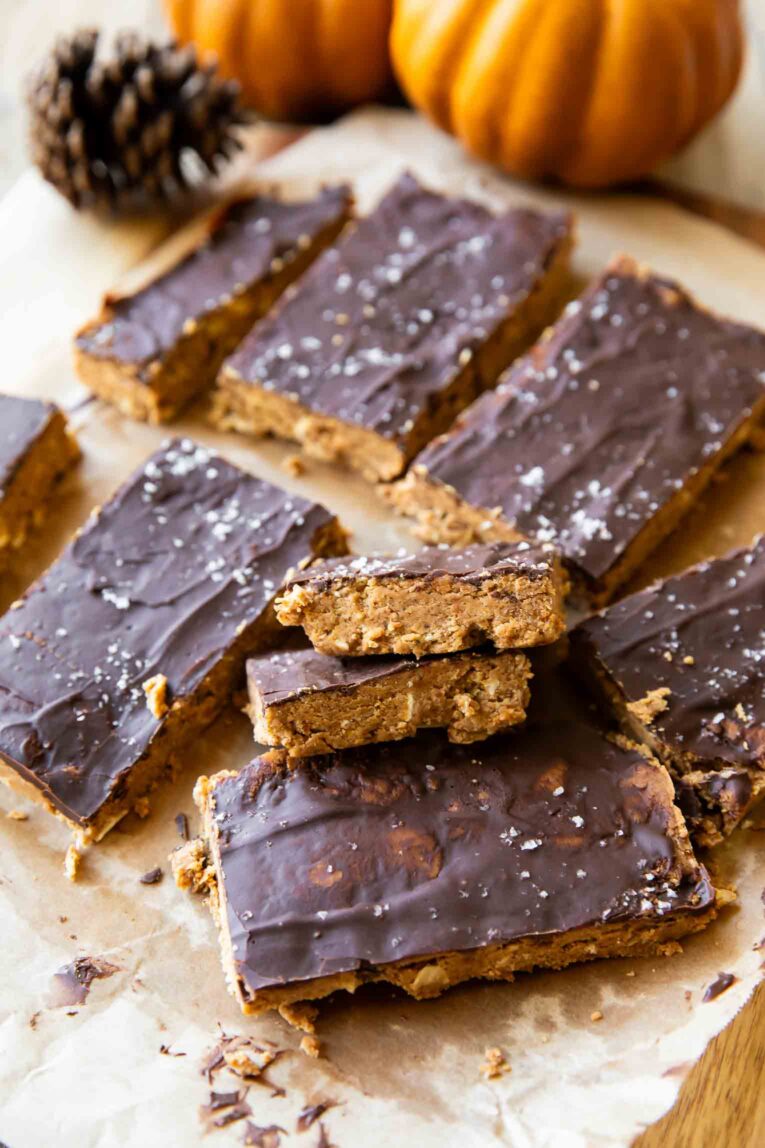 Homemade chocolate Pumpkin Protein Bars on parchment paper.