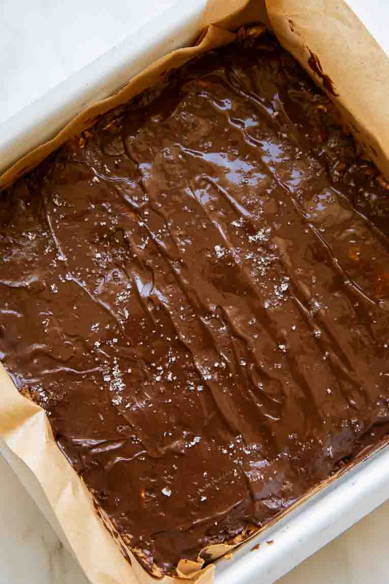 Pumpkin Protein Bars topped with chocolate.