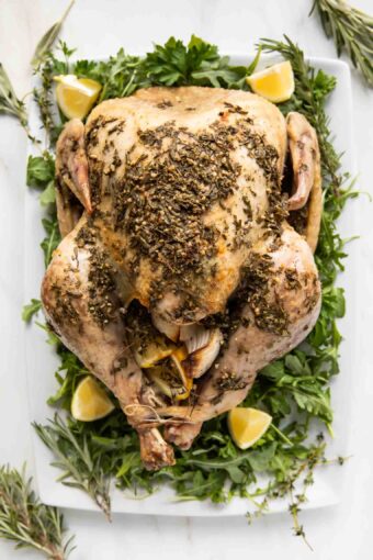 Beautiful roasted turkey with herb butter and seasoning.