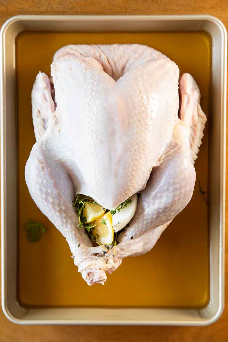 Turkey stuffed with onions, lemons, and herbs.