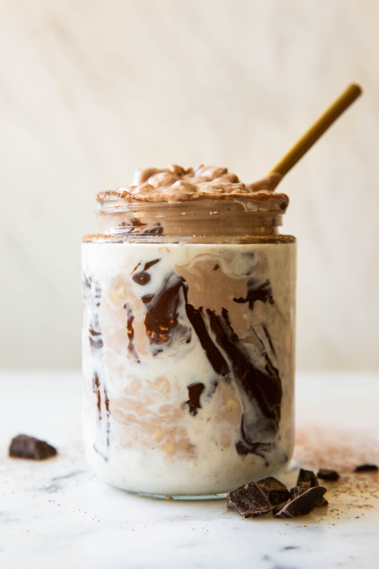 Across photo of Mocha Latte Overnight Oats with a spoon.