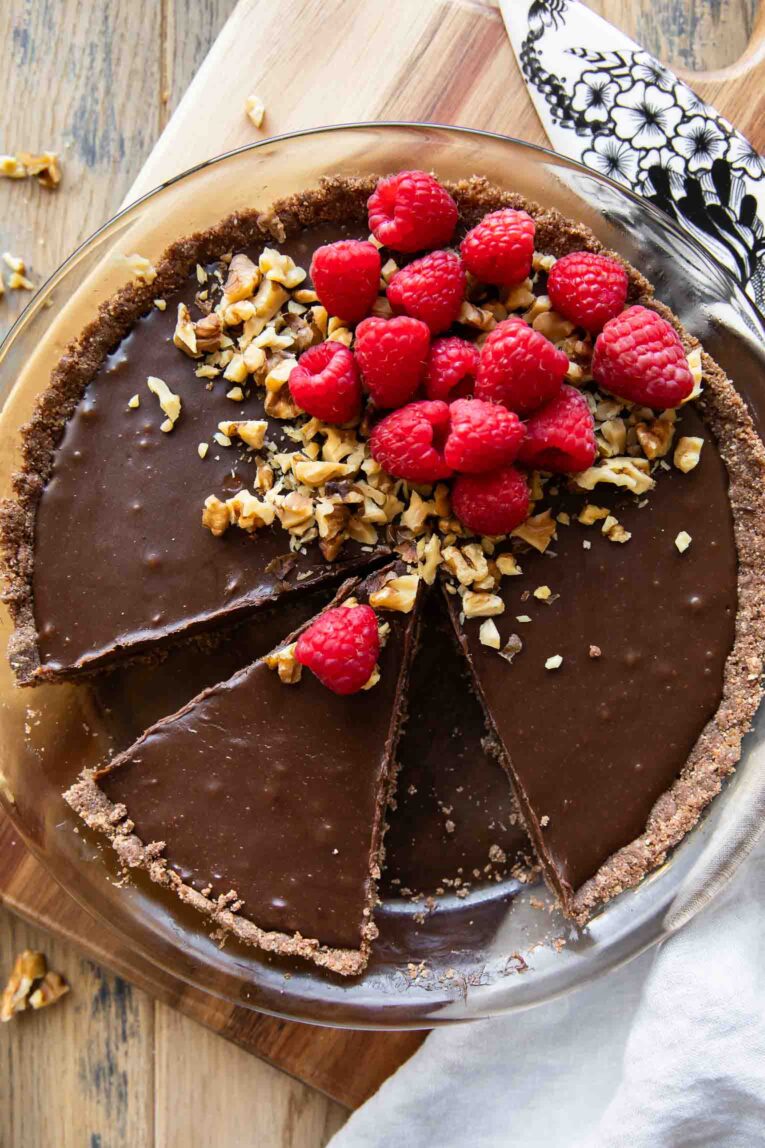 No-bake chocolate pie with raspberries and hazelnut.