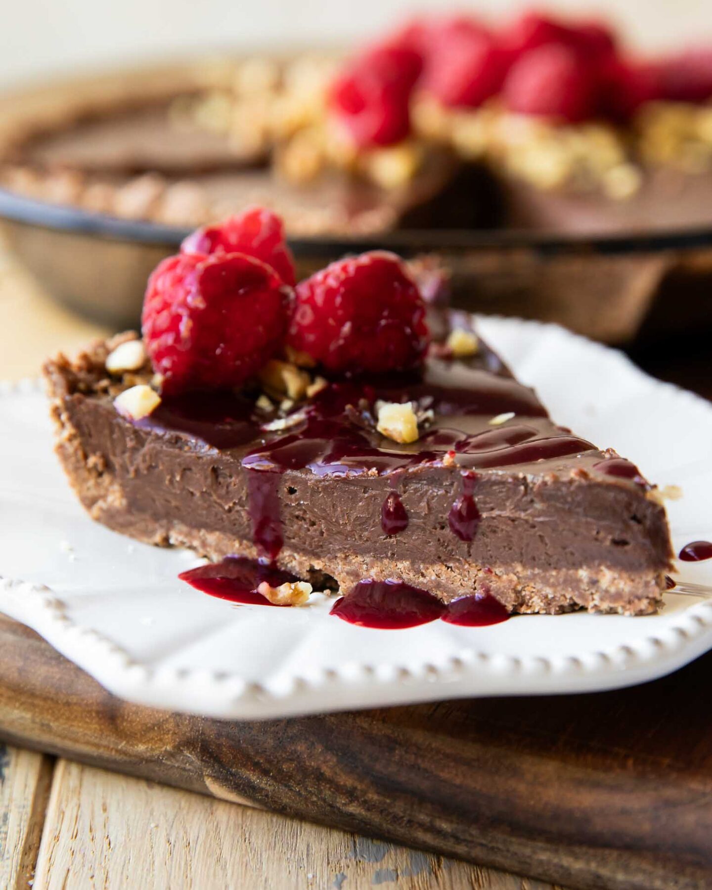 Across slice of Raspberry Chocolate Hazelnut Pie with topping.