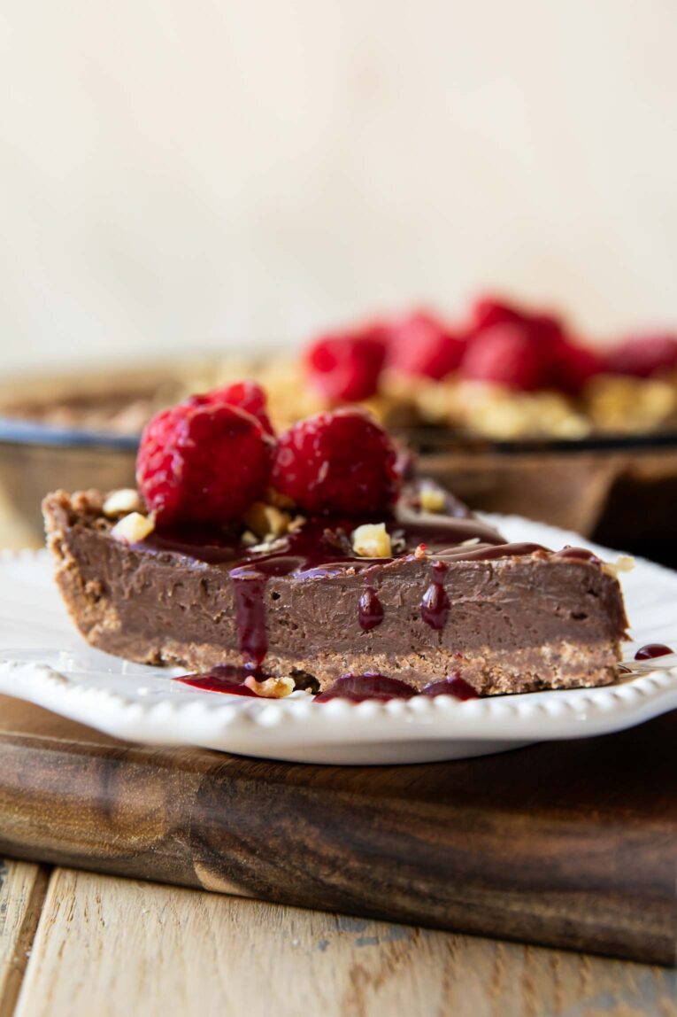 Chocolate pie recipe with raspberry drizzle.