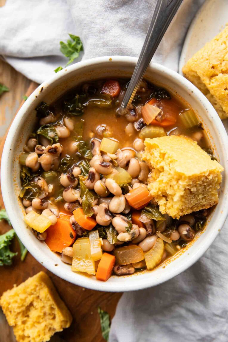 Black Eyed Pea Soup in a bowl with cornbread.