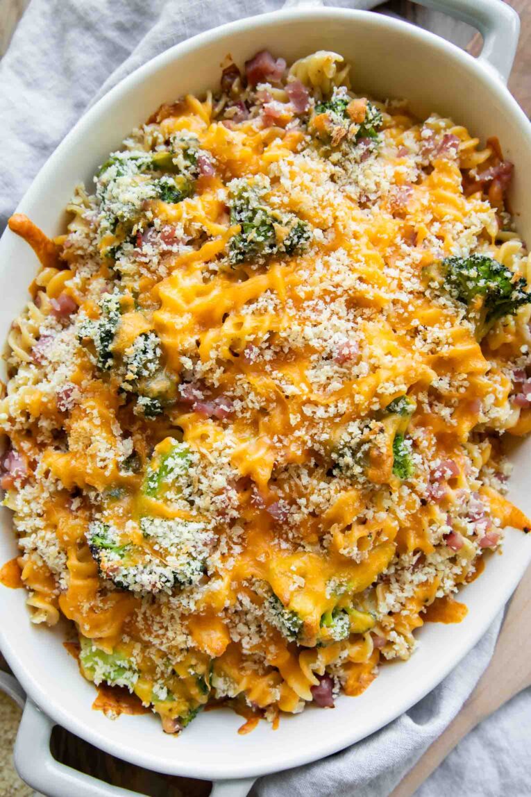 Top shot of Broccoli Cheddar Ham Pasta Casserole recipe in a casserole dish.