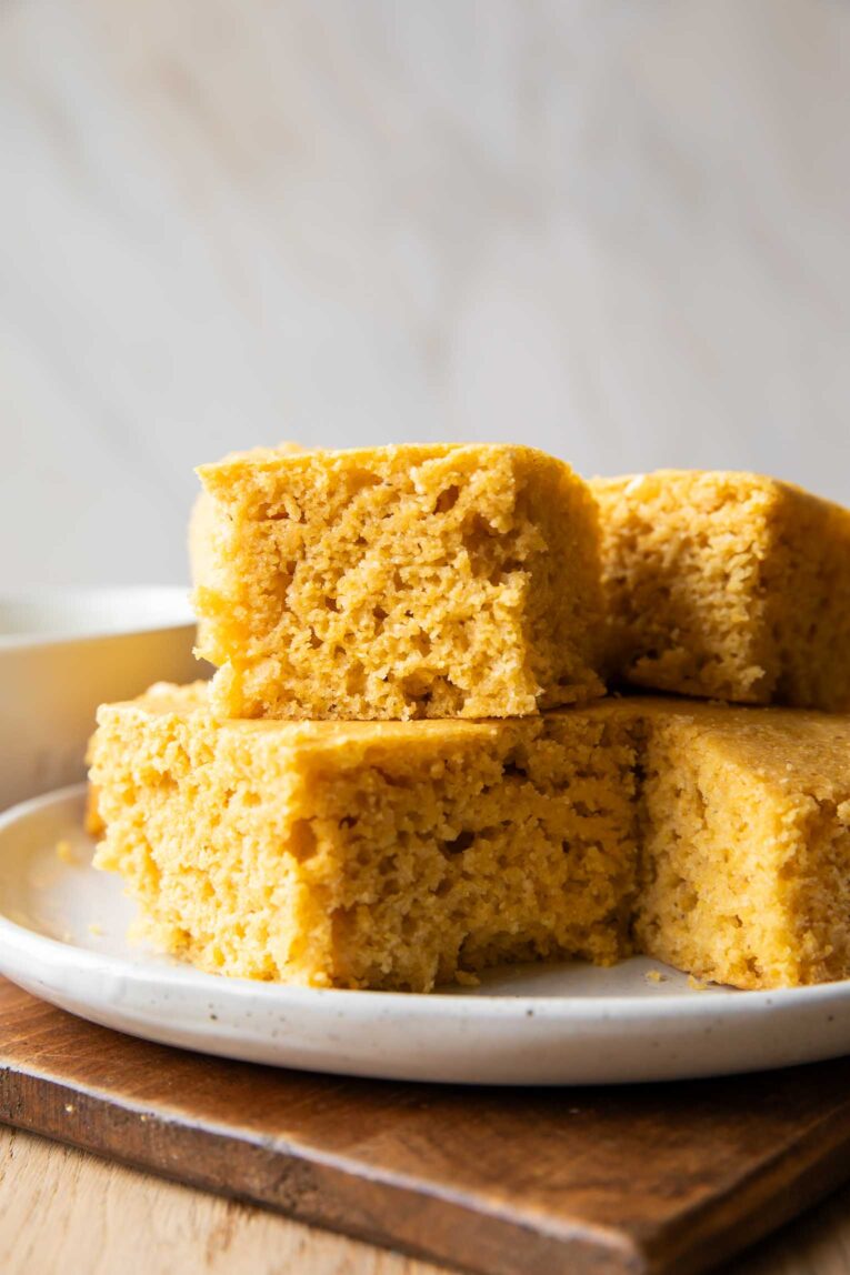 Cornbread Recipe stacked on a plate.
