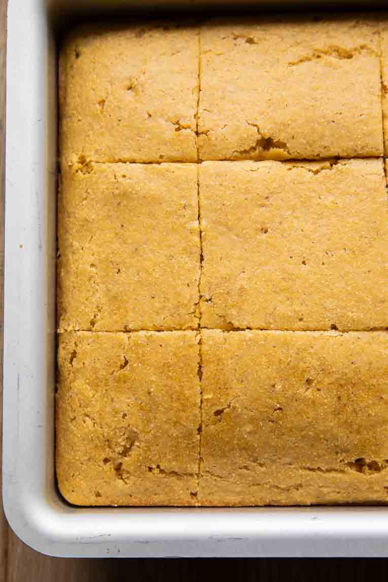 Homemade cornbread in a baking pan.