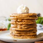Stack of Gingerbread Protein Pancakes on a plate.