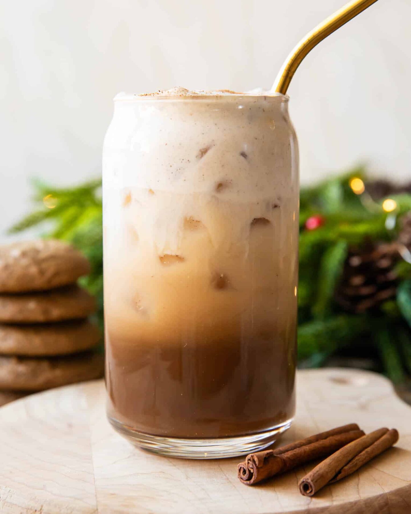 Close up of Iced Gingerbread Oatmilk Chai latte recipe.