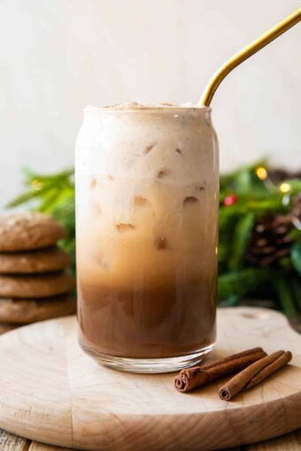 Close up of Iced Gingerbread Oatmilk Chai latte recipe.