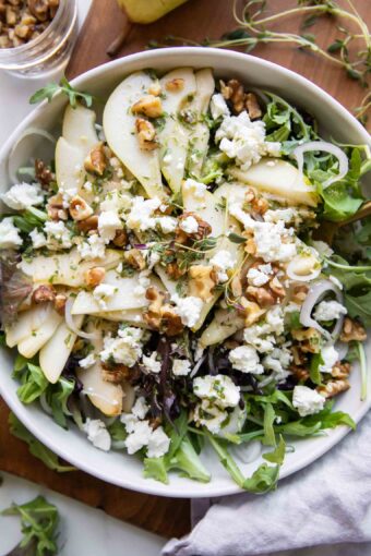 Pear & Goat Cheese Salad over mixed greens and arugula.