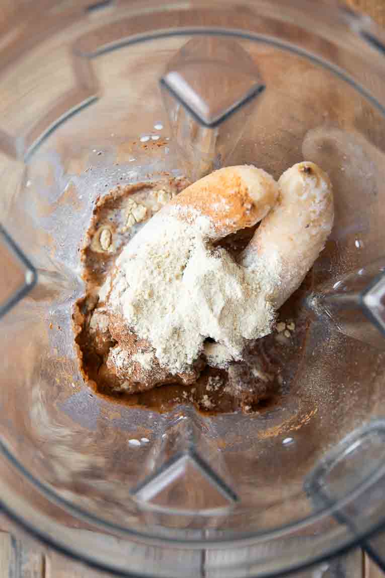 Ingredients for Banana Cashew Butter Chia Seed Smoothie in a blender.