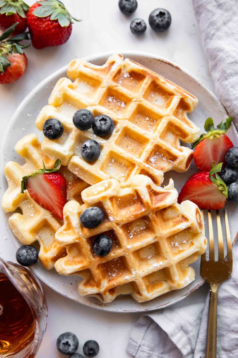 Cottage Cheese Waffles on a plate with berries.