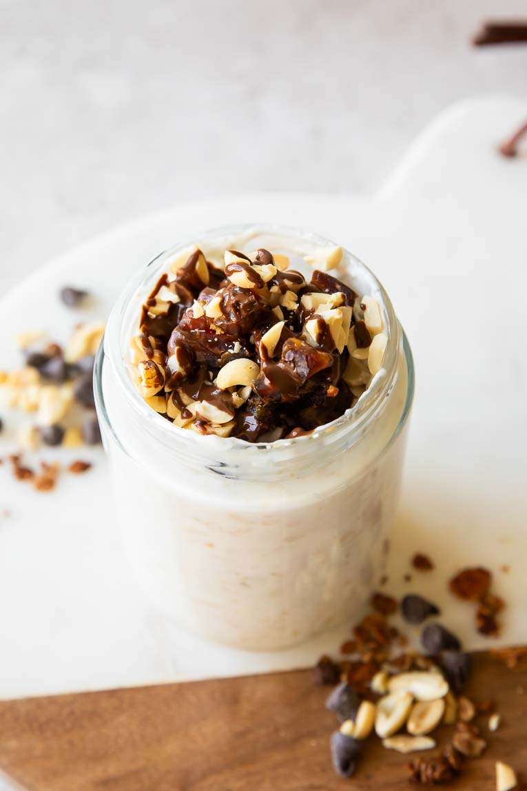 Angled photo of date snickers overnight oats.