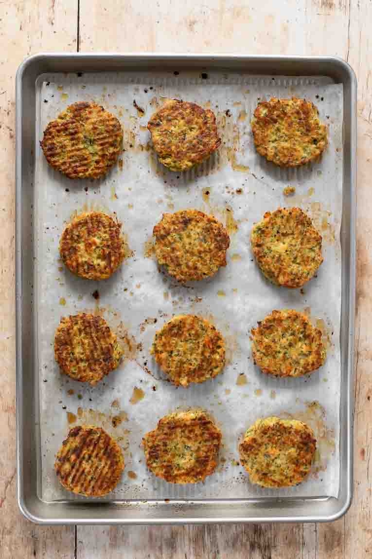 Freshly baked easy Salmon Patties on a baking sheet.