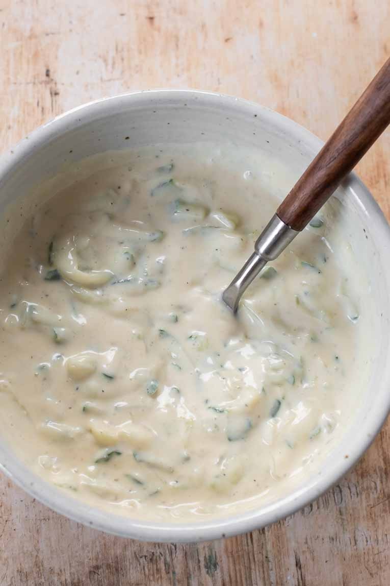 Mixing Tzatziki sauce.