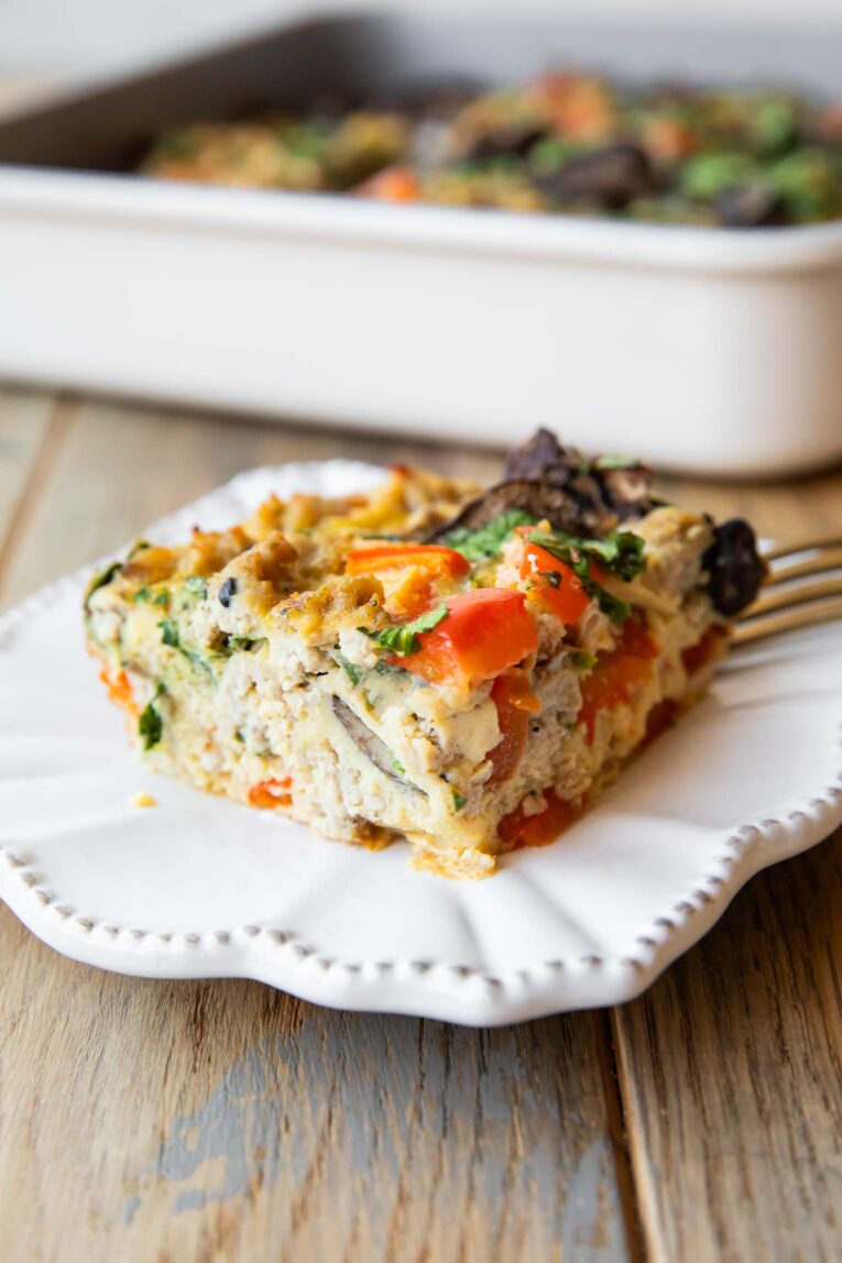 Angled photo of slice of Whole30 Breakfast Casserole.