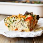 Close up of Whole30 Breakfast Casserole slice on a plate.