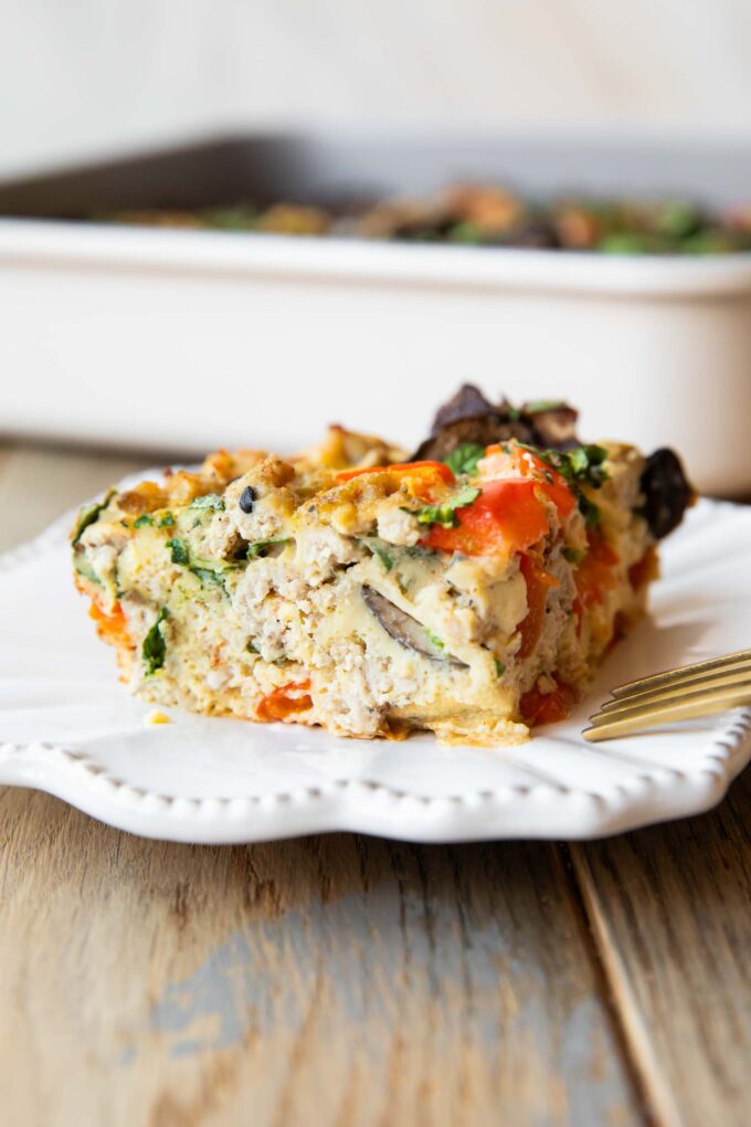 Close up of Whole30 Breakfast Casserole slice on a plate.