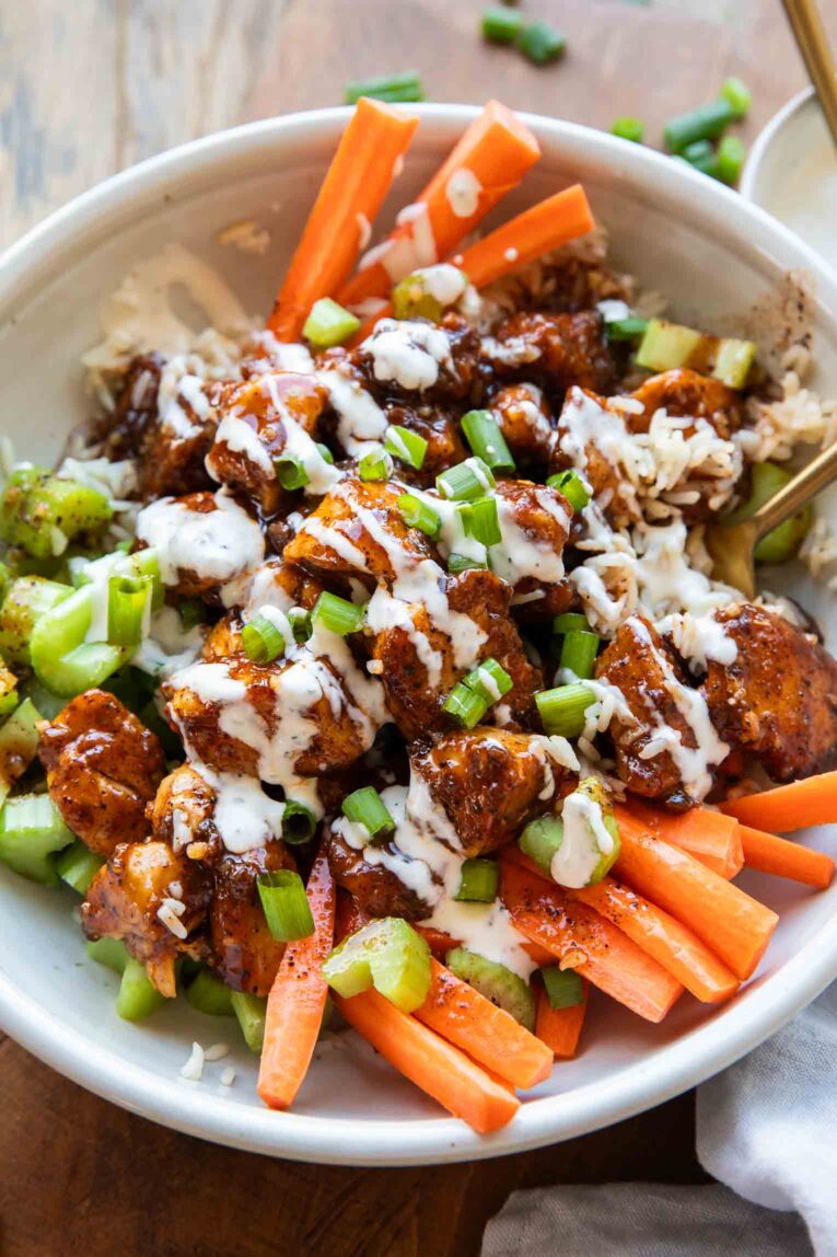 Angled photo of Buffalo Chicken Bowl with ranch dressing.