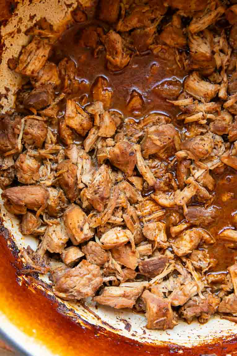 Carnitas cooked in a dutch oven.
