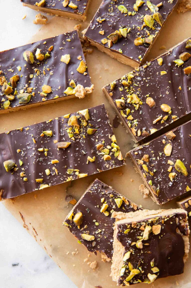 Homemade Peanut Butter Protein Bars on parchment paper.
