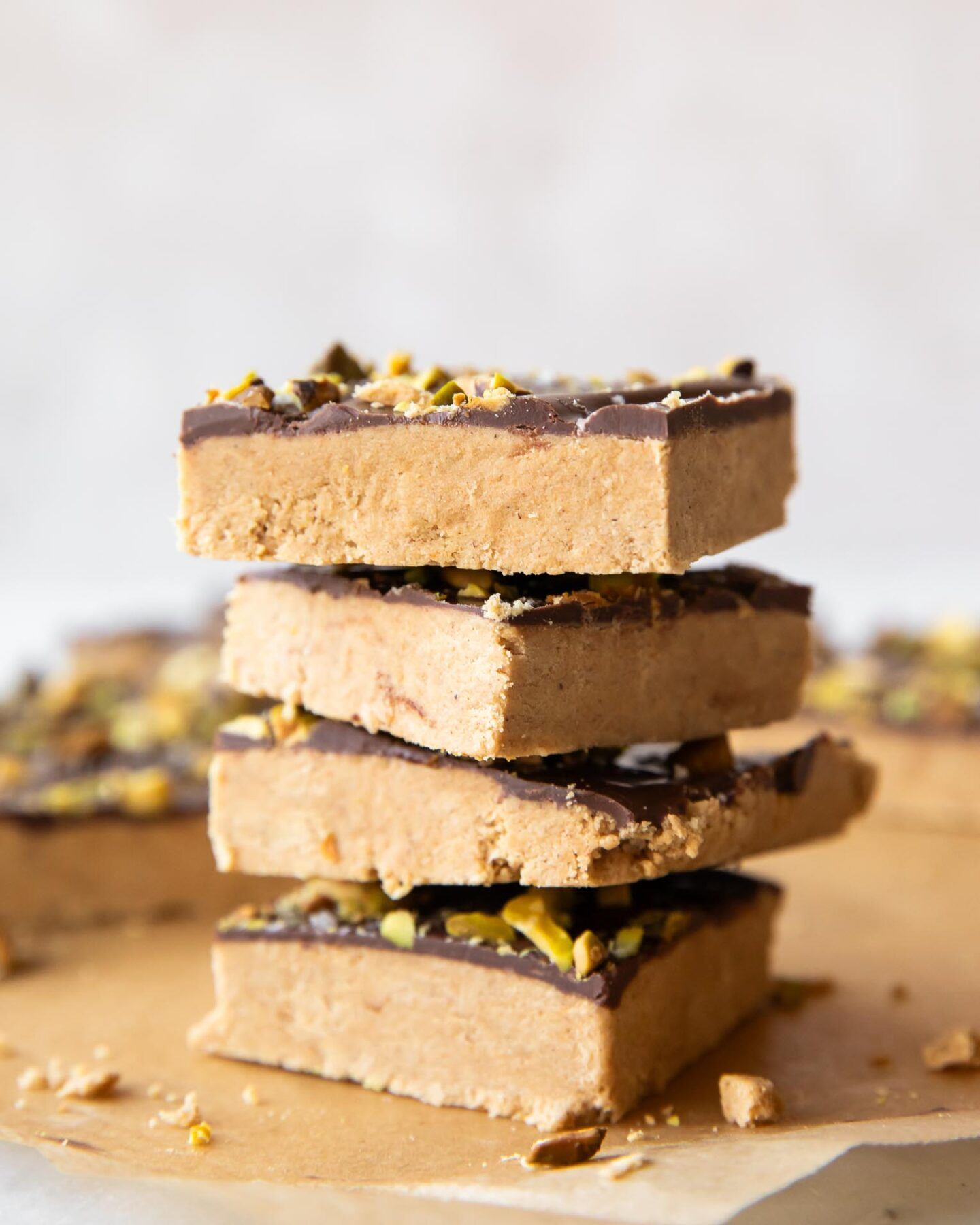 Across photo of stacked Homemade Peanut Butter Protein Bars recipe.