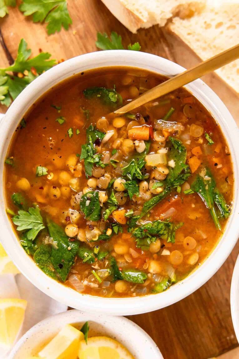 Top shot photo of Lentil Soup Recipe in a bowl with spinach.