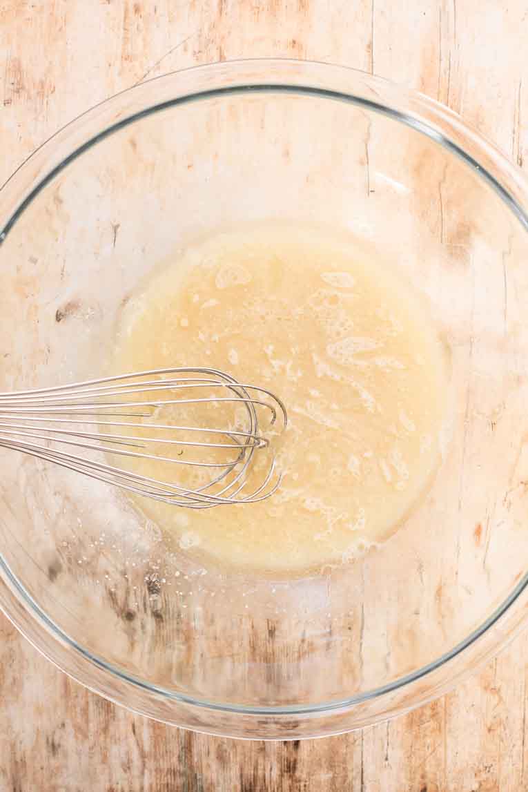 Oil and honey added to active yeast mixture.