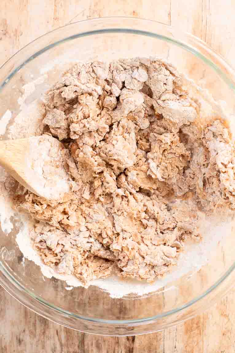 Shaggy dough for bread in a bowl.
