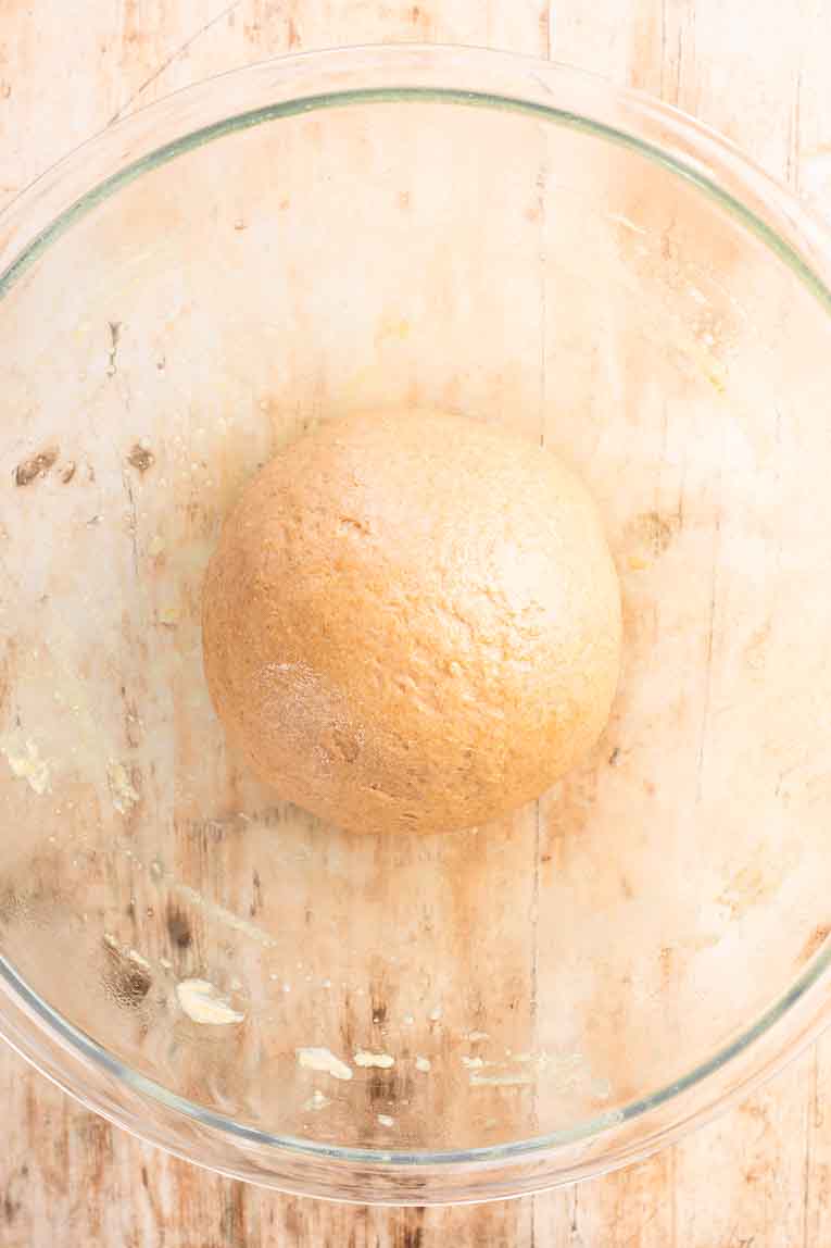 Sandwich Bread dough rolled into a ball.
