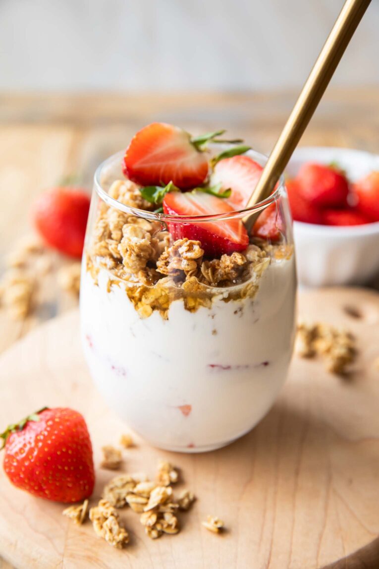 Angled photo of Strawberry Cheesecake Breakfast Parfait recipe.