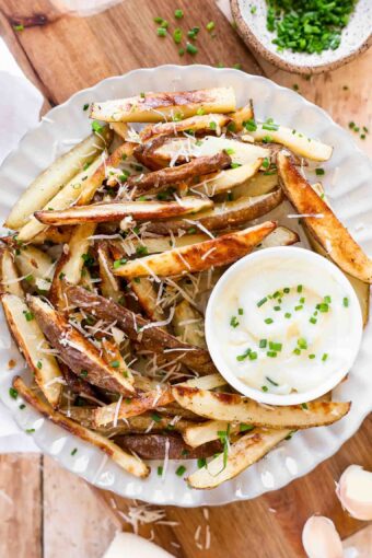 Parmesan Garlic Truffle Fries recipe on a plate.