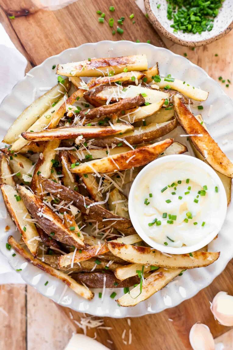 Parmesan Garlic Truffle Fries recipe on a plate.