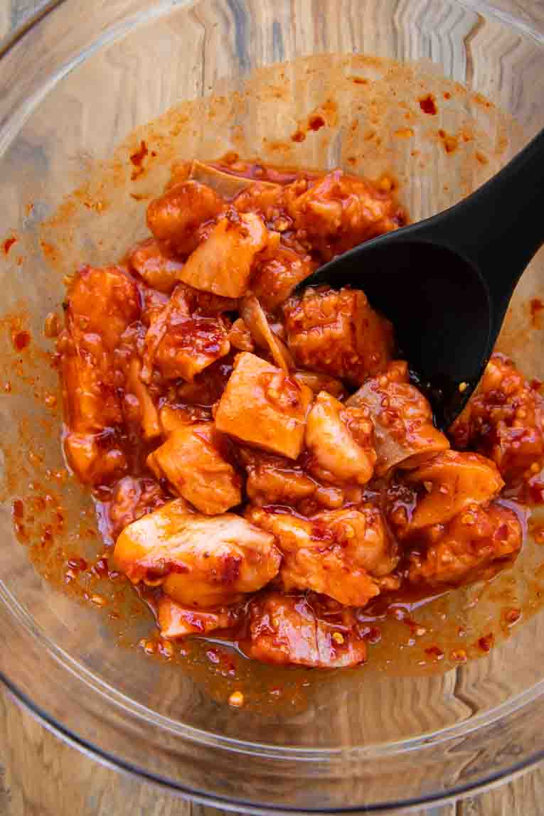 Harissa Salmon Bites in a sauce marinating.