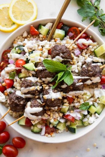 Top photo of Mediterranean Salad Bowl w/ Lebanese Meatballs.