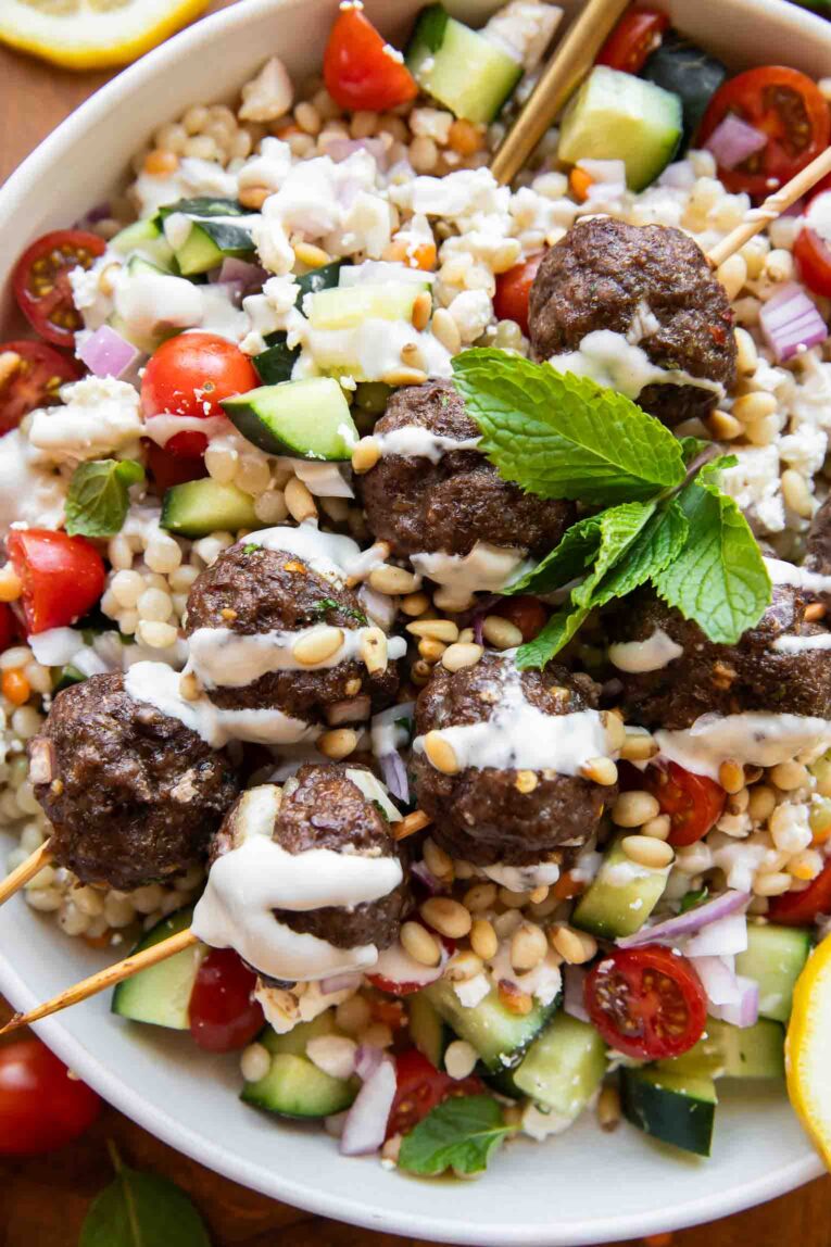 Close up of Mediterranean meatball salad in a bowl.