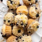 Lemon Blueberry Muffins on a dish.