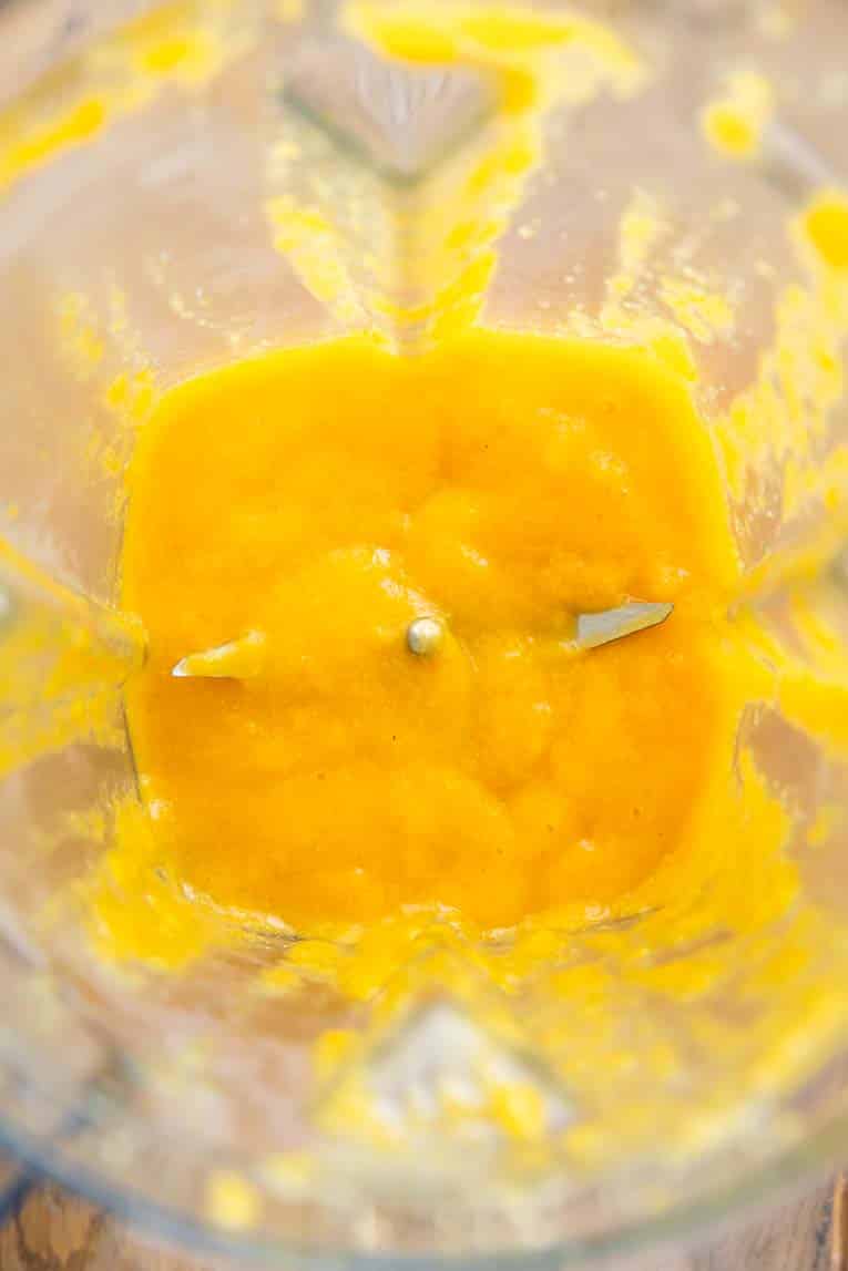 Freshly blended mango habanero sauce in a blender.