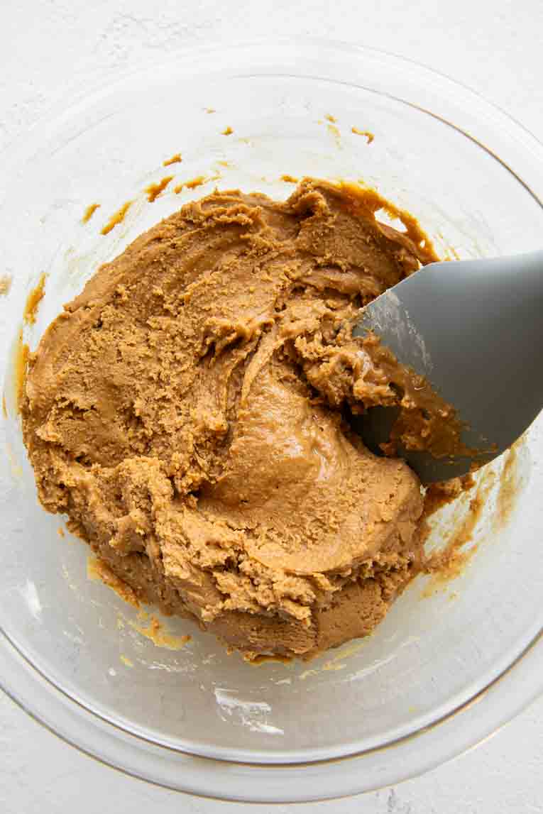 Peanut butter mixture being mixed as filling for eggs.