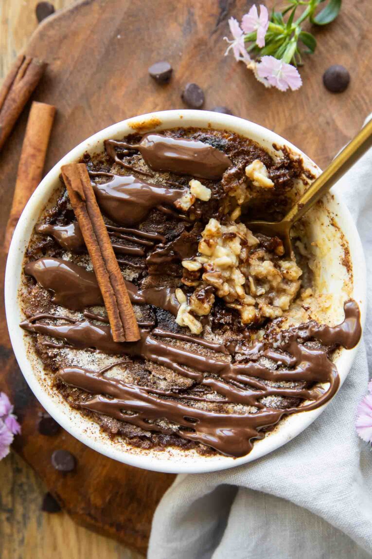 Top photo of Churro Baked Oatmeal with bite taken out.