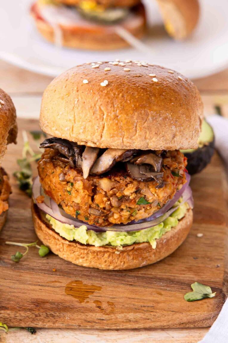 Angled photo of easy veggie burger on a bun.